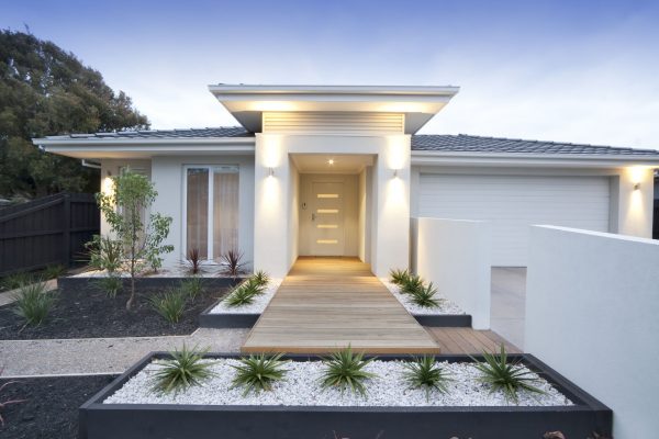 35973993 - facade and entry to a contemporary white rendered home in australia
